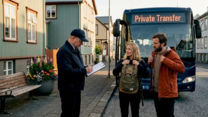 Bus picking up travelers on Reykjavík street